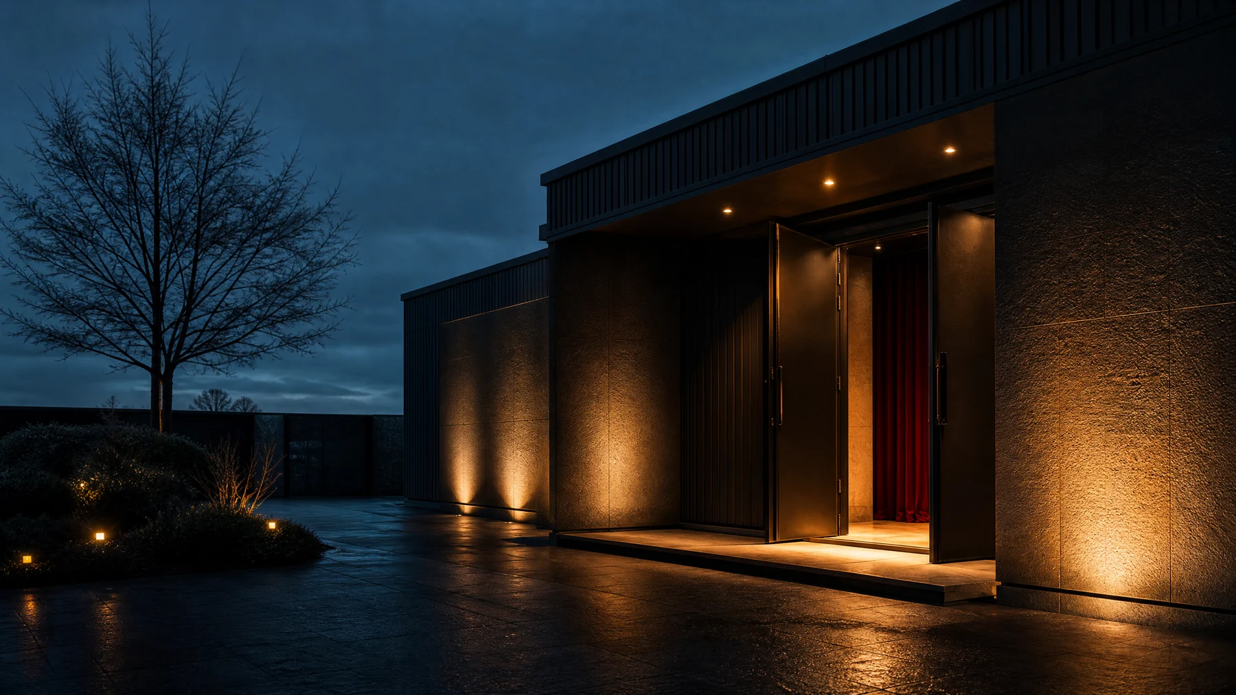 Contemporary theatre exterior at blue hour